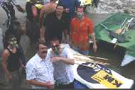 The team with the raft after the race