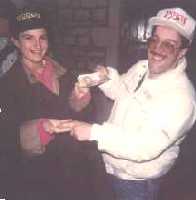 Aurelie and Geoff fighting over the cash