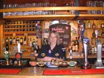 Rachal behind the bar