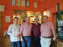 Ben, Tom, El Tel, and myself infront of the bar with same in the back ground