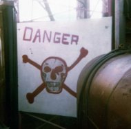 Sign at the base of the Broadcast mast on the ship.