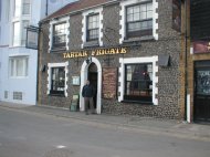 Paul outside the Tartar Friget by the Harbour