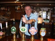 Tye behind the bar at The St Crispin at Worth